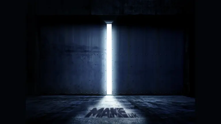 Bright white beam of light from an open door in a dark room.