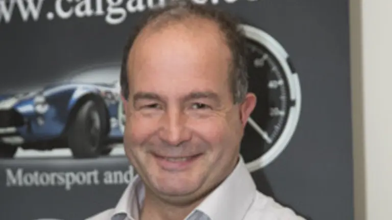 Man smiling for the camera.