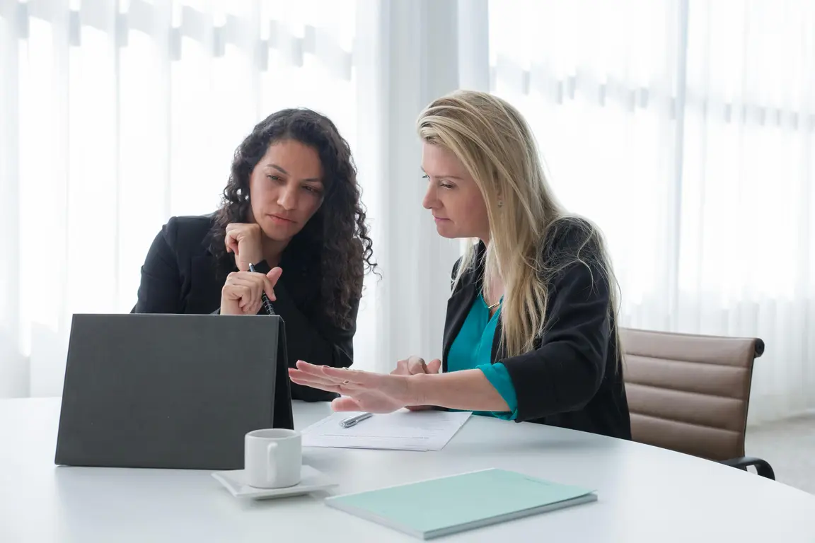Female office workers in a meeting