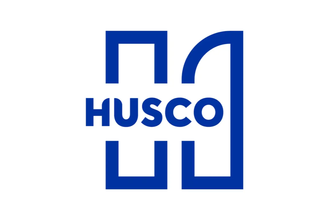Logo for HUSCO with the letter H inside a blue square for National Manufacturing Day
