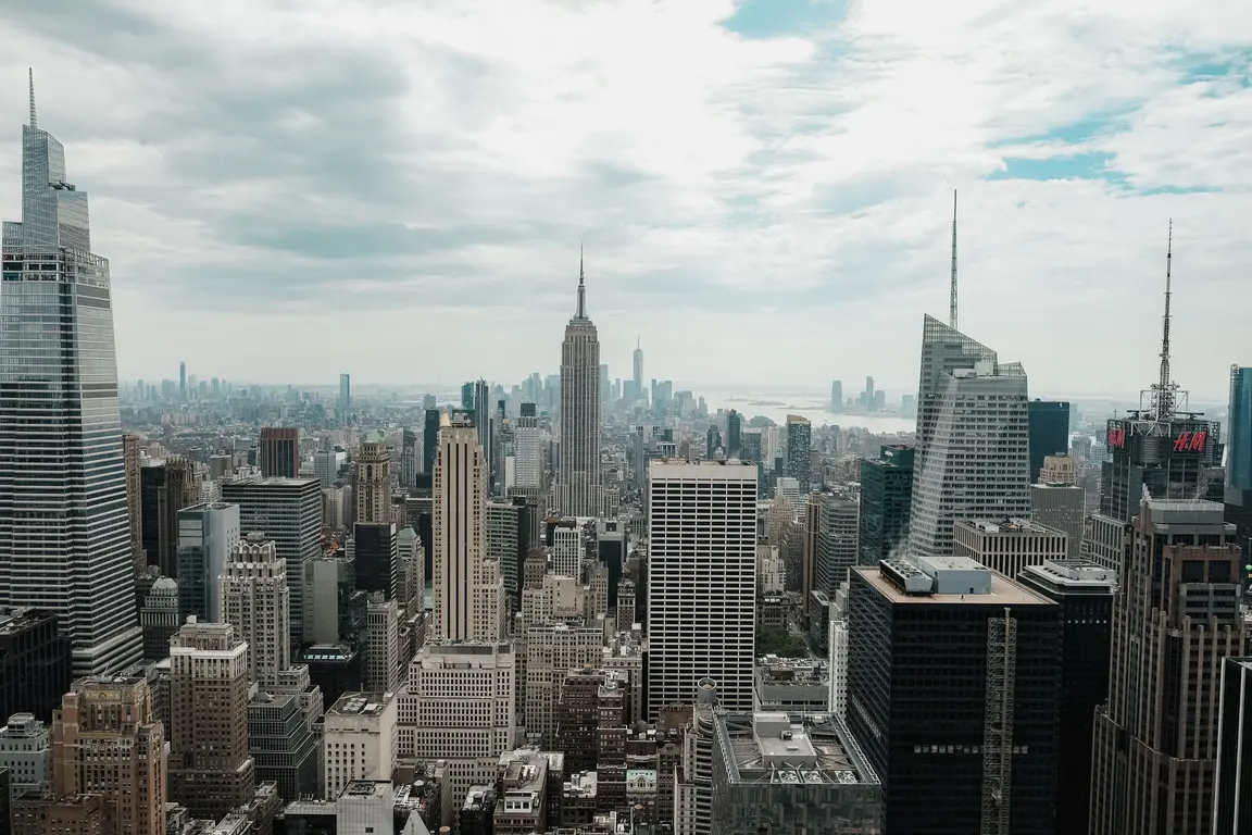 High angle view of new york city with many skyscrapers.