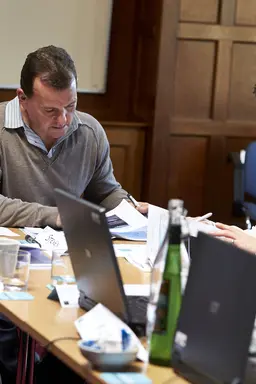 People working together on training course