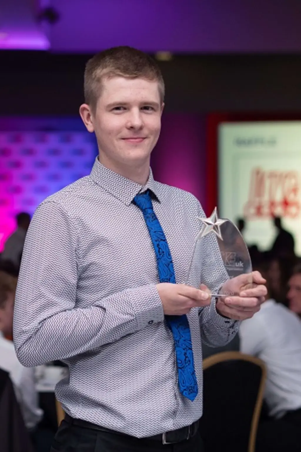 Winner of the Final Year Award, Harry Halford holding his award