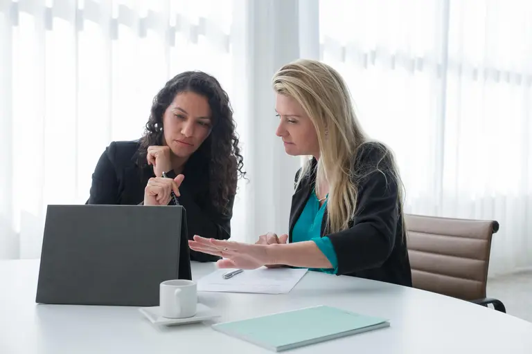 Female office workers in a meeting