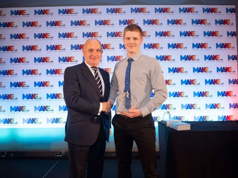 Winner of the Final Year Award, Harry Halford, receiving his award from Stephen Phipson