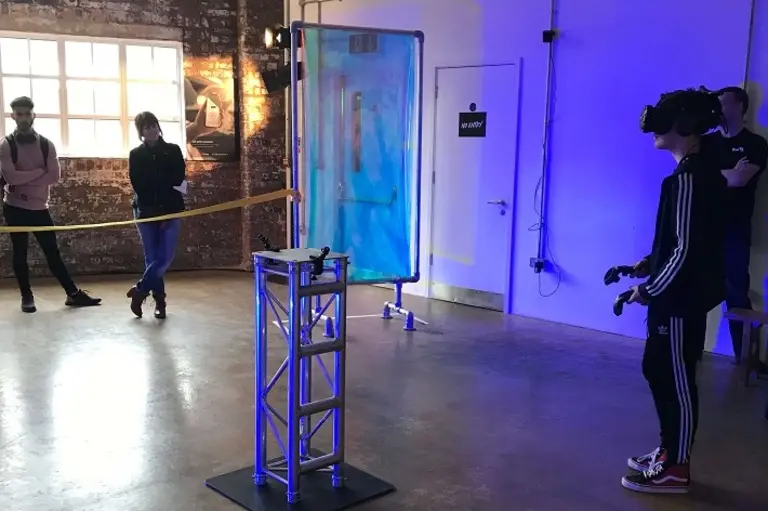 Picture of young person trying out VR technology